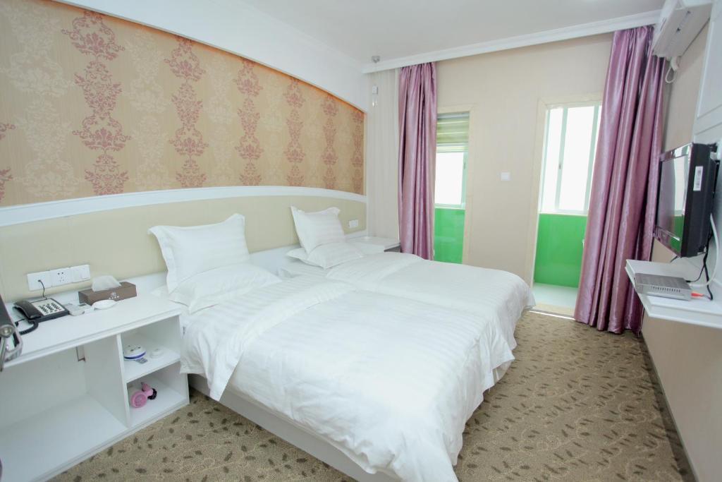 Xinghe Xinfeng Hotel Kanton Pokoj fotografie